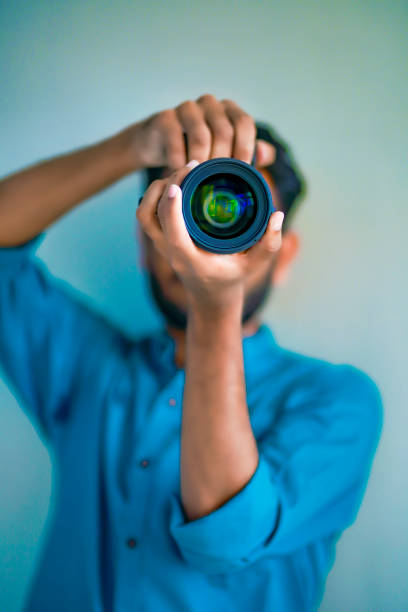 istock Photographer With Camera on white background. 1325350364