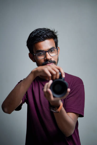 istock Photographer With Camera on white background. 1325350372