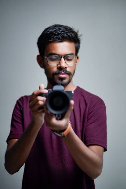 istock Photographer With Camera on white background. 1325350374