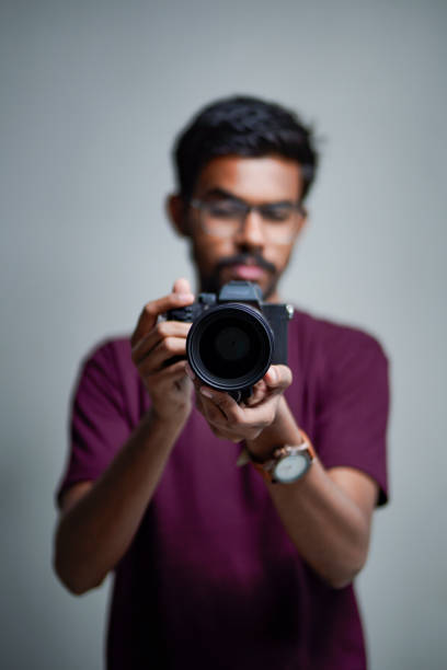istock Photographer With Camera on white background. 1325350388