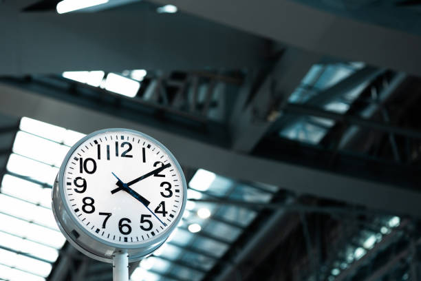 istock Large Clock in airport terminal Building. 1325350523