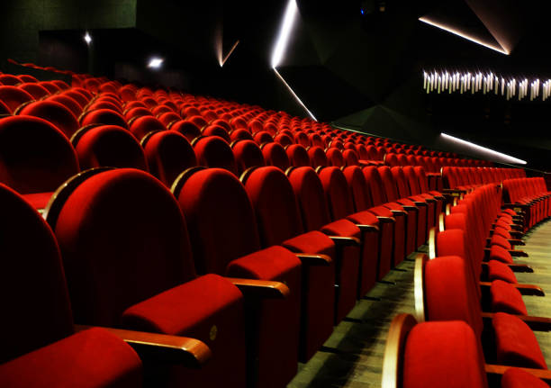istock numbered theater chairs with red velvet 1325352829