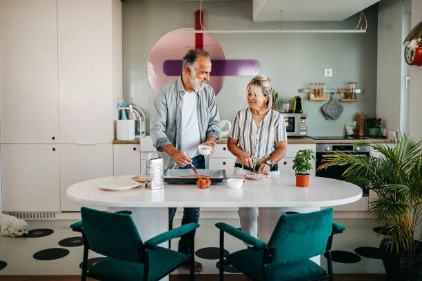 istock Couple preparing food 1325353705