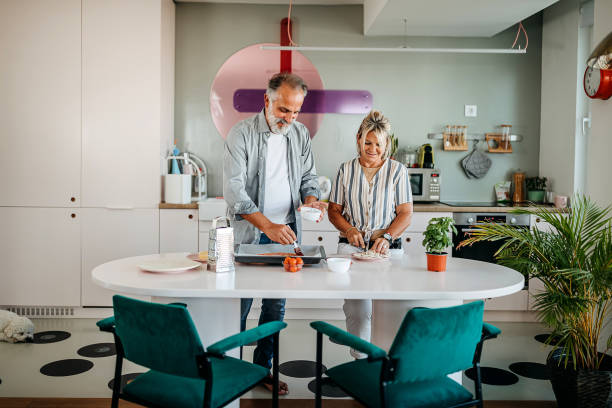istock Couple preparing food 1325353707