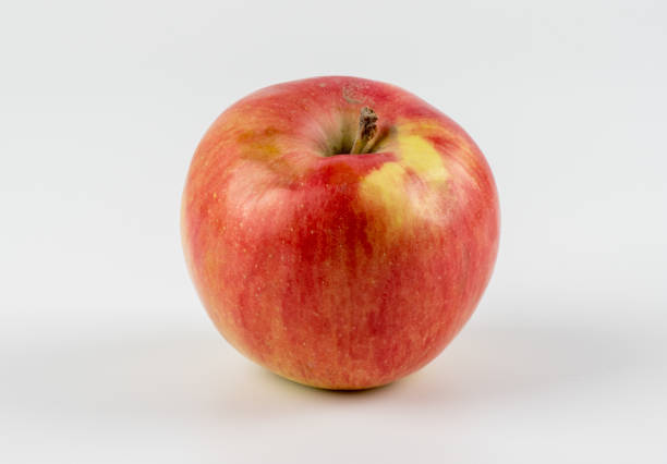 istock Fresh red apple fruit isolated on the white background 1325355518