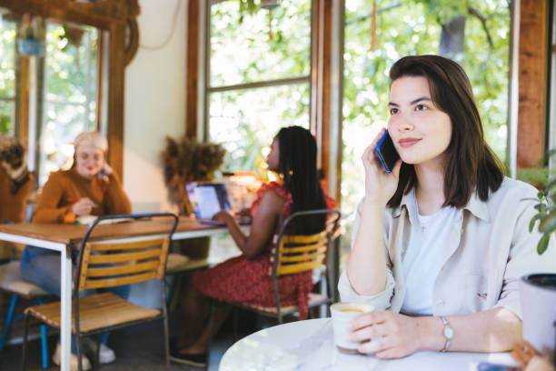 istock Girls at a coffee shop 1325357409