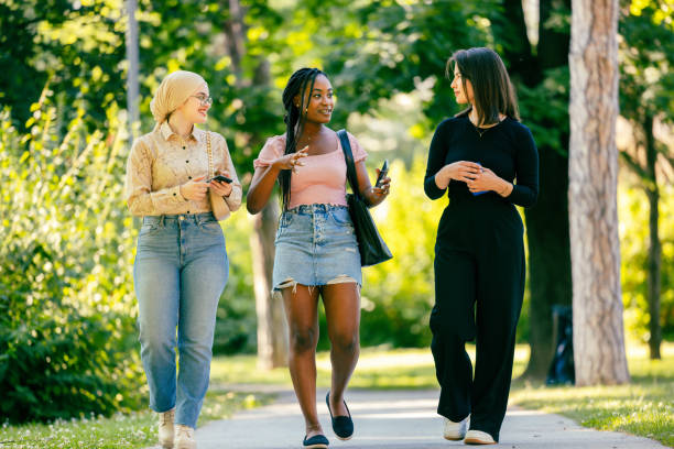 istock Girls walking back home after their college 1325357839