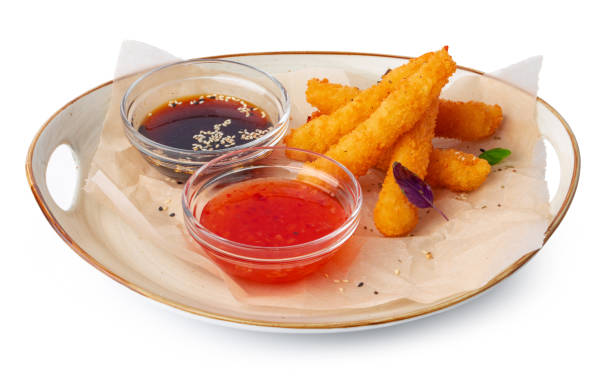 istock Deep fried shrimps with sauce on plate isolated on white 1325359131