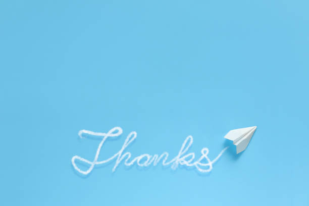 istock Paper airplane writing the word. 1325362687