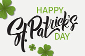 istock Happy St. Patrick's Day greeting. Lettering St. Patrick's Day on a light background 1325362777