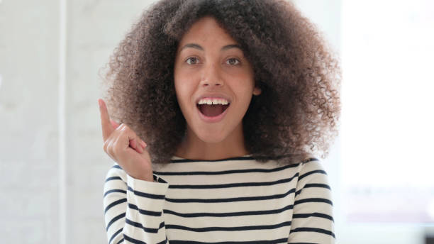 istock Excited African Woman Having a New Idea 1325363612