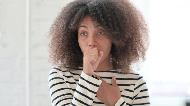istock Allergic African Woman Coughing and Feeling Sick 1325363826
