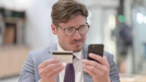 istock Online Payment Failure on Smartphone for Businessman 1325365564