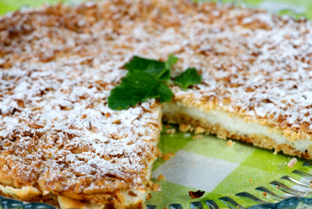 istock Yogurt pie from sprinkled dough with mint leaf on a tray 1325366737
