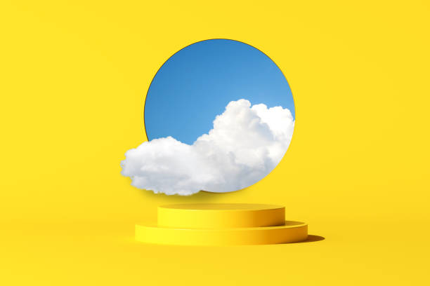istock 3d rendering of fluffy cloud in a circle window and yellow square podium for product presentation. Minimal concept. 1325366864