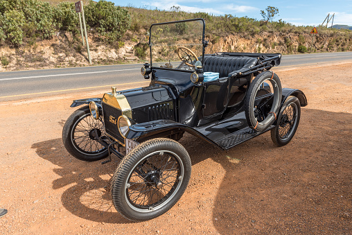 Franschhoek, South Africa - April 12, 2021: A Model-T Ford from 1915 on the Franschhoek Pass in the Western Cape Province