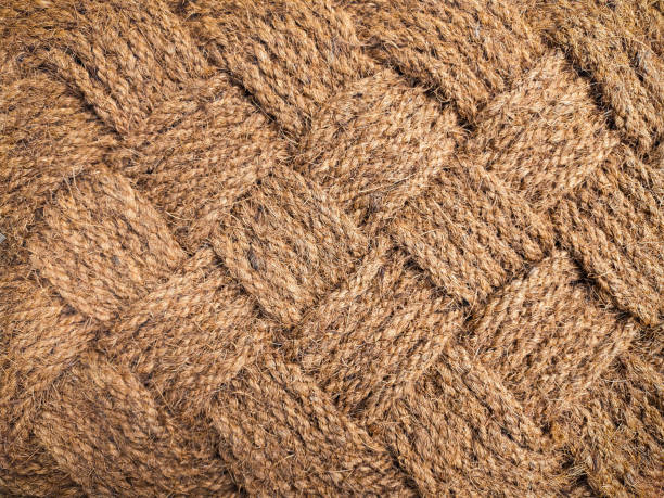 ジュートラグクローズアップ。ジュート織りが近いです。菱形、背景、質感のある大織りの断片。リントフリーのカーペット。 - sewing close up pattern wool ストックフォトと画像