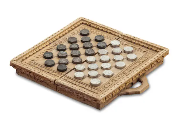 Medieval checkers or draughts. Board game made with old Midde Ages muslim and christian coins