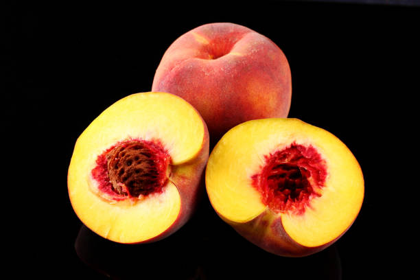 istock Many peaches cut whole close up 1325370123