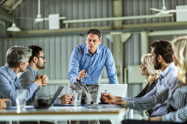 istock CEO talking to his team on a meeting in the office. 1325372614