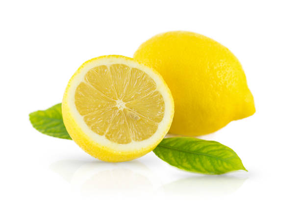 fresh lemons on white - lemon imagens e fotografias de stock