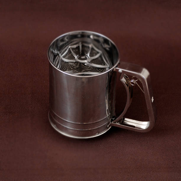 istock modern home kitchenware with steel sieve bootle plate 1325373624