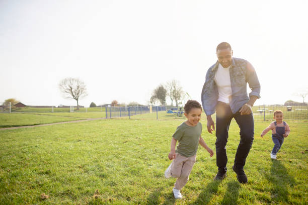 istock Fun in the Public Park With Dad 1325373725
