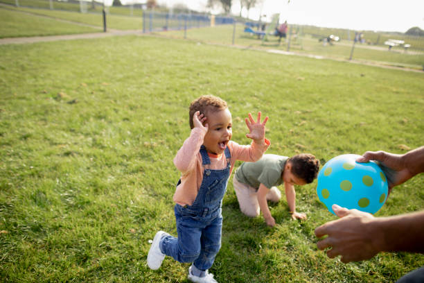 istock Playing in the Public Park 1325373770