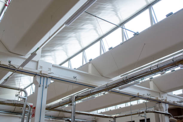istock industrial interior - ceiling of a factory 1325374873