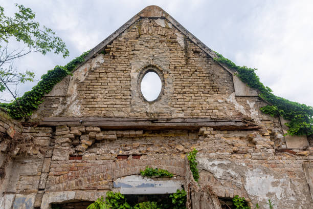 The abandoned Fernbach Castle, also known as Baba Pusta, was built in 1906 by Karol Fernbach for his own needs. Aleksa Santic, Serbia - June 06, 2021: The abandoned Fernbach Castle, also known as Baba Pusta, was built in 1906 by Karol Fernbach for his own needs. pusta stock pictures, royalty-free photos & images