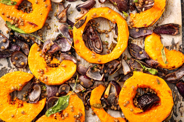 oven baked butternut squash with lentils - butternut squash roasted squash cooked imagens e fotografias de stock