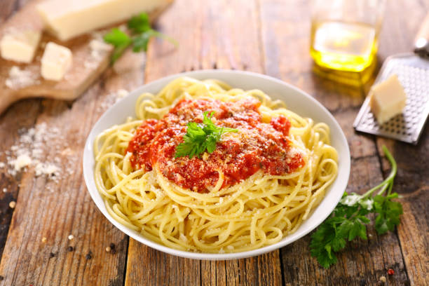 istock spaghetti with tomato sauce and parmesan 1325382417