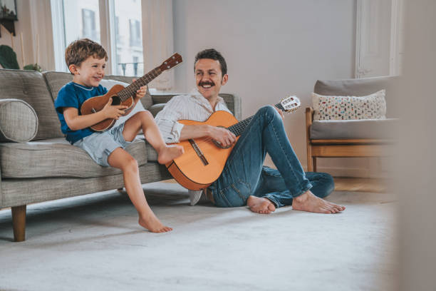 istock Family playing music at home 1325384184