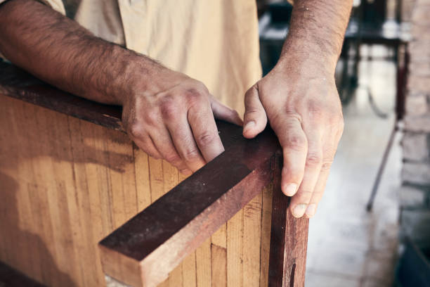 istock Man assembling furniture and fixing it - hobby concept. 1325384354