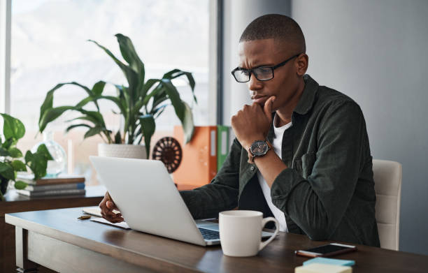 istock Shot of a young businessman planning while working from home 1325384420