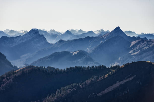 Swiss alps seen from Mount Kronberg in the Appenzell Alps Beautiful high angle panoramic view from mountain peaks in the European alps in Switzerland. Hazy atmosphere on a beautiful autumn day. appenzell ausserrhoden stock pictures, royalty-free photos & images