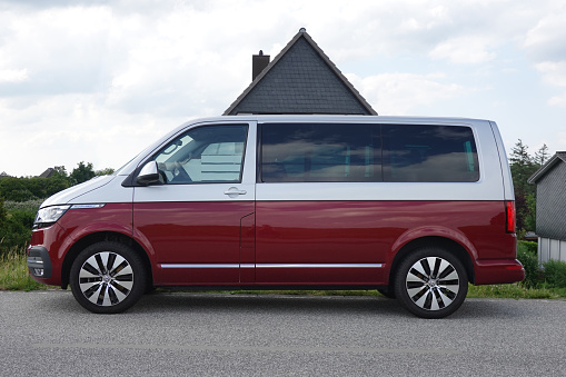 Hamburg, Germany - June 20,  2021: Close up of Volkswagen T6 Multivan parked on the country road, in Hamburg, Germany.