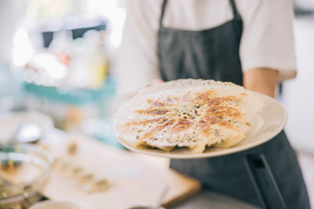 istock Freshly made gyozas on plate 1325387520