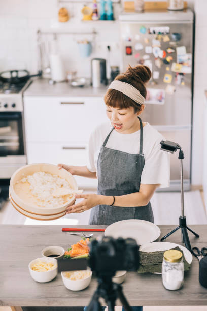 istock Japanese woman filming a food tutorial 1325387599