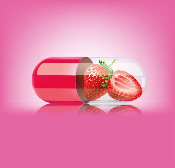 istock Medical pink capsule with strawberry on pink background. Vector illustration 1325388866