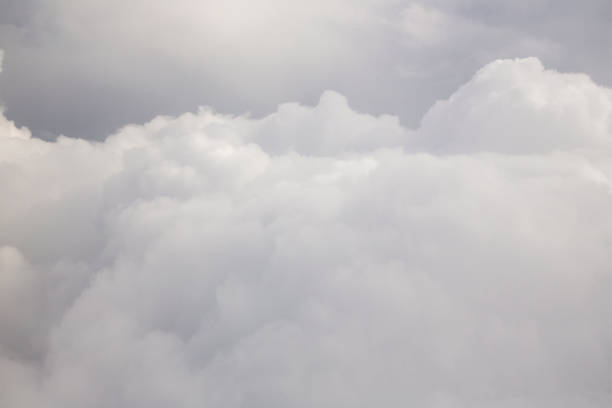 istock Sunny sky abstract background, beautiful cloudscape, on the heaven, view over white fluffy clouds 1325389988