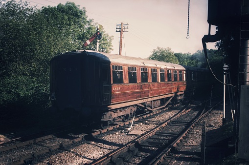 Abandoned old railway wagons at station. Old train wagons