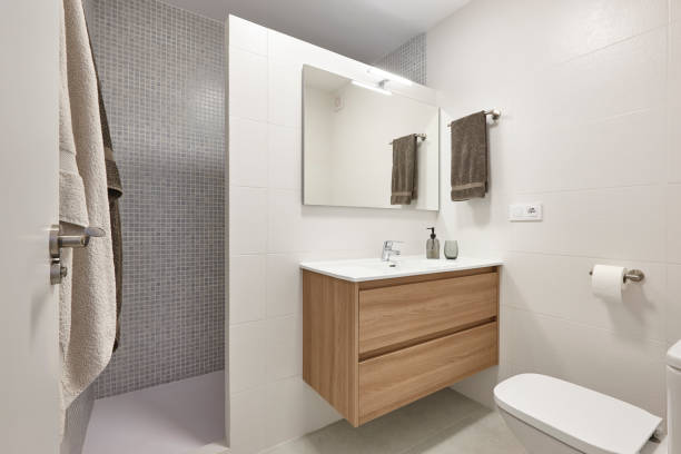 istock Modern bathroom interior with shower and sink. Decoration 1325396233