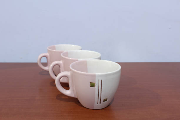 istock Three cups of coffee close together 1325397299