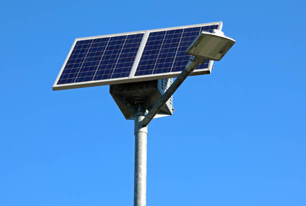 istock solar panel that produces electricity to make the street lamp work without polluting 1325397747