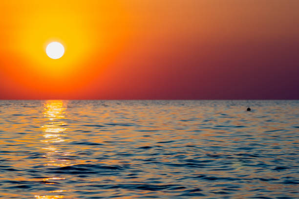 istock Amazing sea sunset, the sun, waves, clouds 1325401298