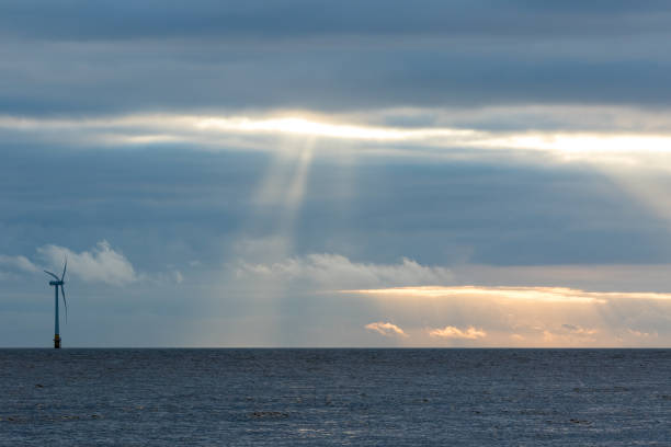 istock Renewable energy. Sustainable resources. Beautiful sky and seascape background image 1325402673