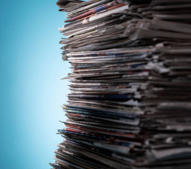 istock Pile of newspapers, studio shot. 1325405670