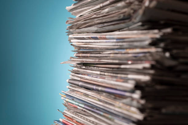 istock Pile of newspapers, studio shot. 1325405691