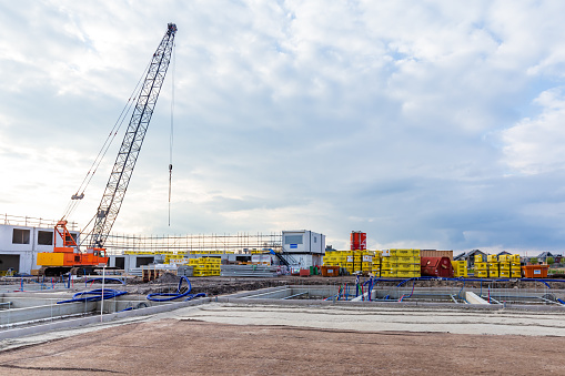 Blauwestad, The Netherlands -May 1, 2021: Building site with crane in the newly developed city Blauwestad in Oldambt Groningen in The Netherlands